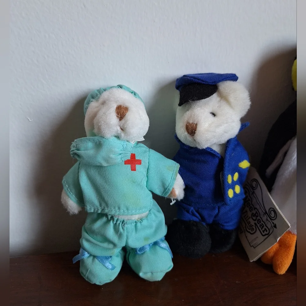 Collectible teddy bears from the Ganz brand, specifically from the Wee Bear Vill